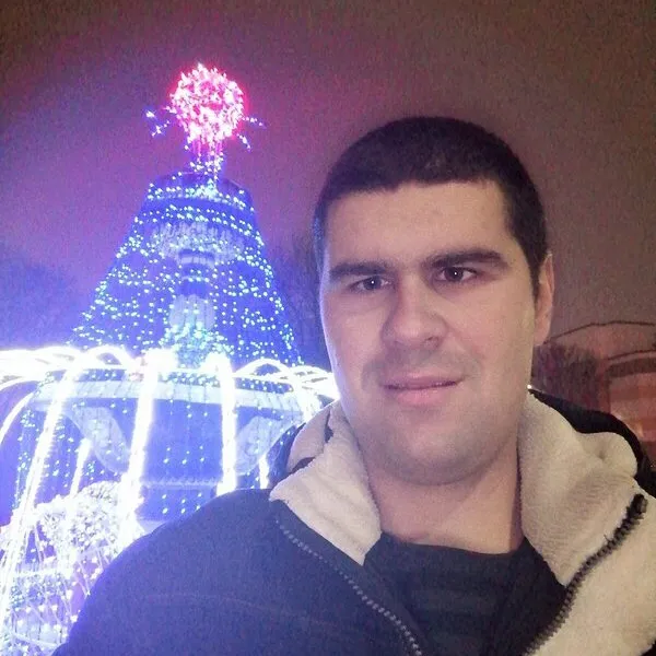 Николай